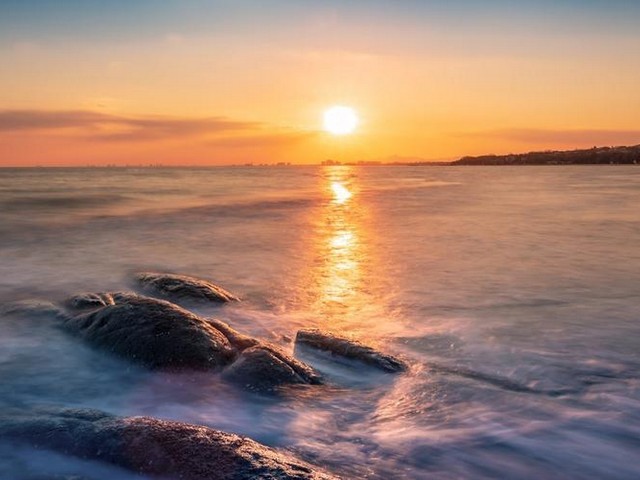 描写海边夕阳的优美段落